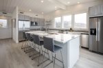 Fully equipped kitchen with 180 degree views of Fisher Beach 